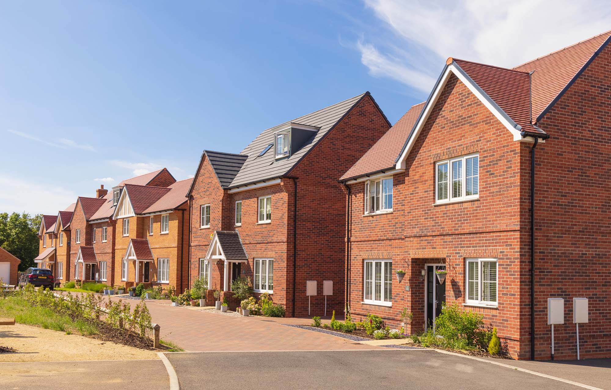 New build homes. UK. Stansted Mountfitchet, Essex. June 2021. Examples of detached new build homes.